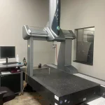The Hexagon Global S Green 9.15.8 DCC Coordinate Measuring Machine (CMM) is a high-precision, bridge-style metrology system configured with a measuring envelope of 35.4″ (900 mm) in the X-axis, 59.1″ (1500 mm) in the Y-axis, and 31.5″ (800 mm) in the Z-axis. Built under Hexagon’s Enhanced Productivity Series (EPS), the "Green" tier is engineered for cost-effective, versatile throughput and reliability in standard manufacturing and production environments.